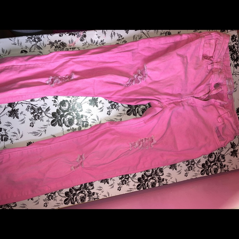 Pink ripped pants